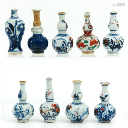 A Collection of 9 Miniature Vases