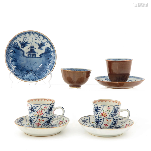 A Collection of 4 Cups and Saucers