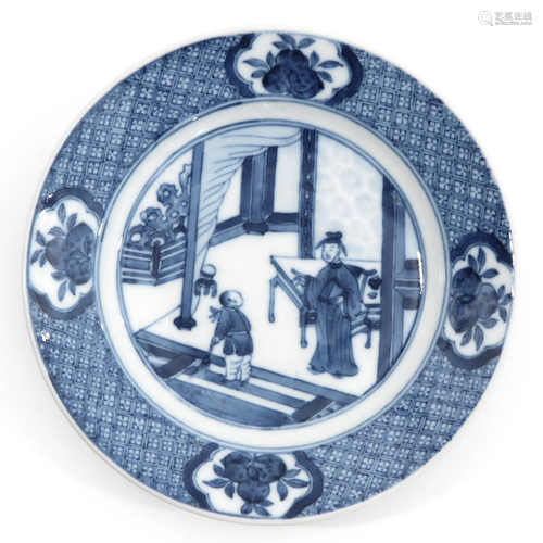 A Small Blue and White Plate