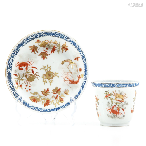 A Polychrome Decor Cup and Saucer