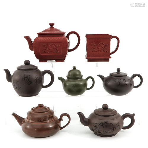 A Collection of 7 Yixing Teapots