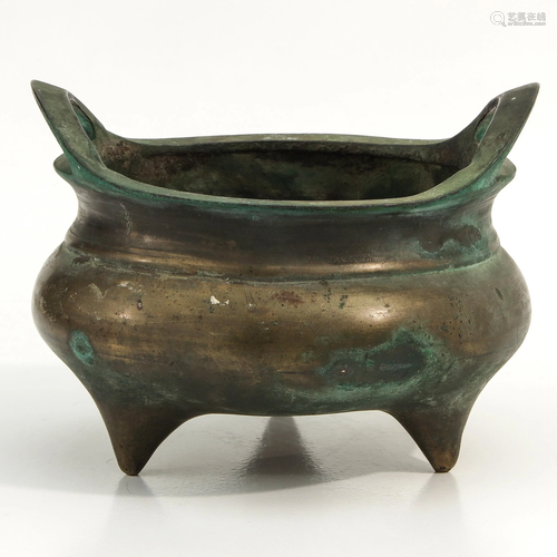 A Bronze Tripod Censer