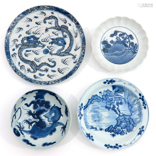 A Lot of 4 Blue and White Plates