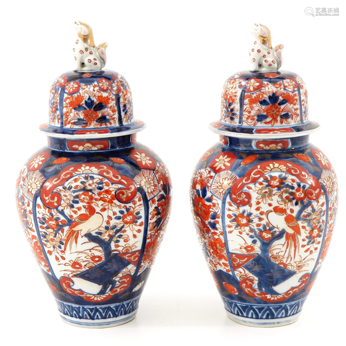 A Pair of Imari Vases with Covers