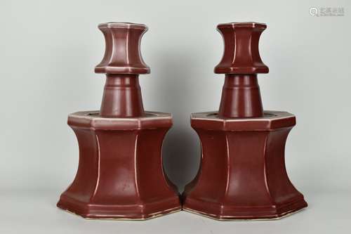 pair of chinese red glazed porcelain candlesticks