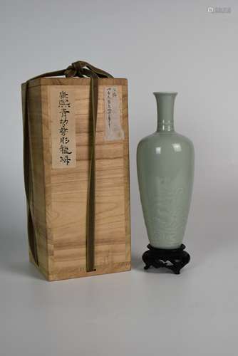 A Celadon Glazed Carved Sea Water and Dragon Vase