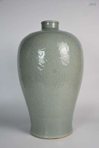 A Celadon Glazed Carved Plum Blossom Vase