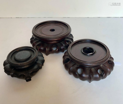 Three Finely Carved Hongmu Wood Stands in Lotus Form