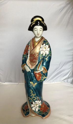 A Rare Japanese Kakiemon-style Porcelain Figure of
