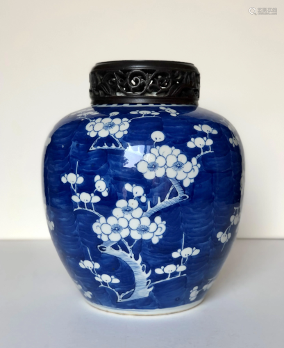 A Chinese Blue and White Prunus Jar with Wood Cover