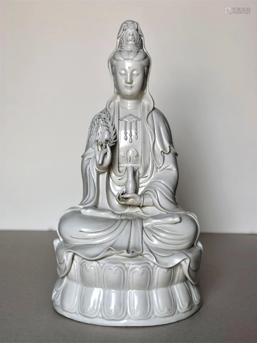 A Chinese Blanc-de-shine Seated Guanyin, 20th century