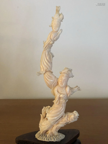 A Finely Carved Angel-Skin Coral Sculpture of