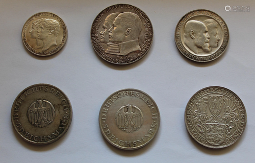 6 silver coins.