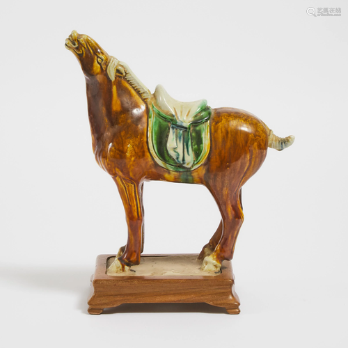 A Tang Style Sancai-Glazed Pottery Figure of a Horse,