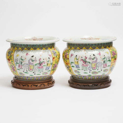 A Pair of Yellow-Ground Famille Rose Fish Bowls,