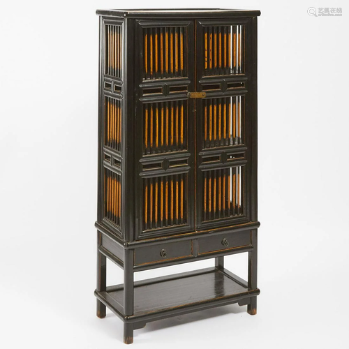 A Chinese Black Lacquered 'Spindle' Cabinet, Early to