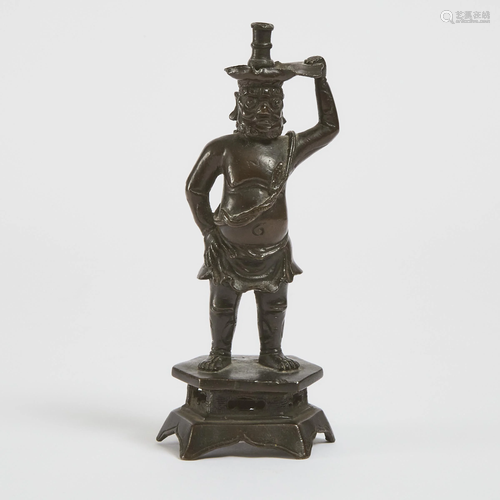 A Bronze 'Foreigner' Candlestick, Ming Dynasty, 17th