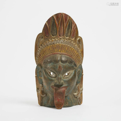 An Indian Polychrome Wood Mask of Kali, 19th Century,