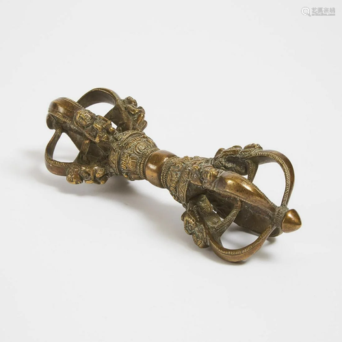 A Gilt Bronze and Iron Vajra, Tibet, 15th Century or