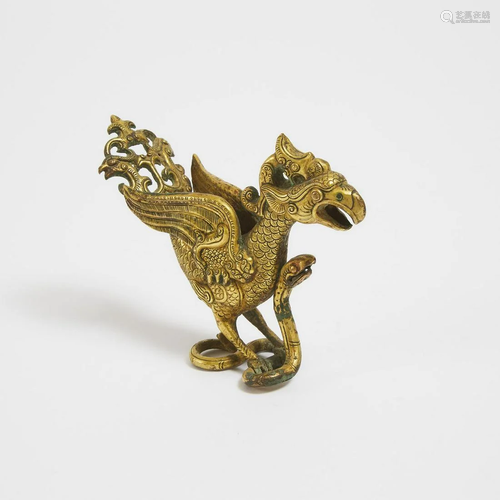 A Tibetan Gilt Bronze Figure of Garuda, 15th Century or