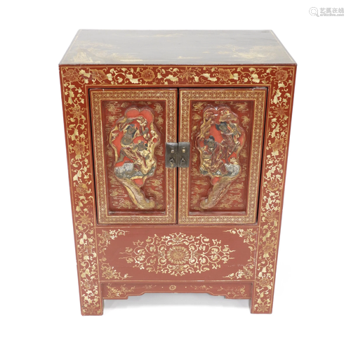 A Chinese Small Cabinet with Carved Door Panels,