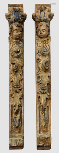 Zwei Rokoko-Pilaster mit Engelsköpfen und