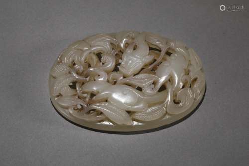 Hetian jade animal pattern buckle in Qing Dynasty