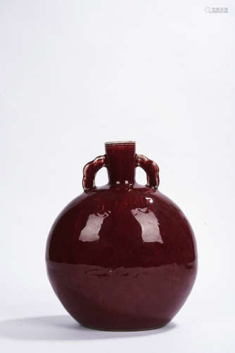 A red glazed moonflask