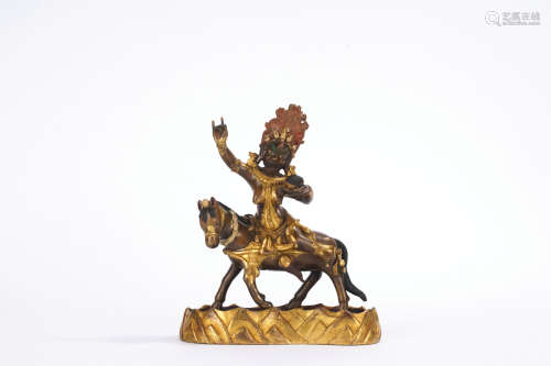 A gilt-bronze statue of Palden Lhamo
