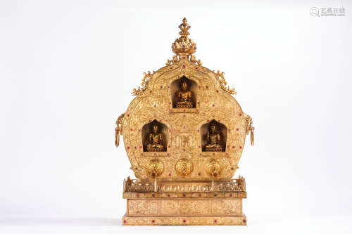 A gilt-bronze buddha