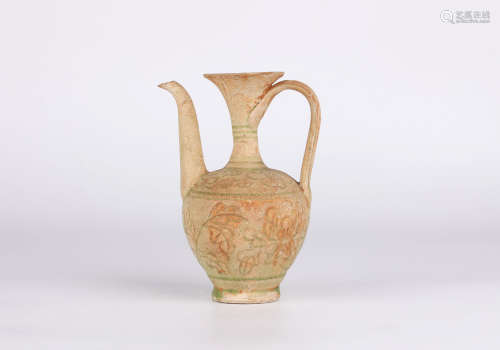 A celadon-glazed pot