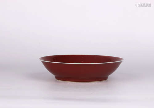 A red glazed dish