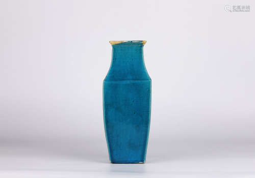 A blue glazed vase