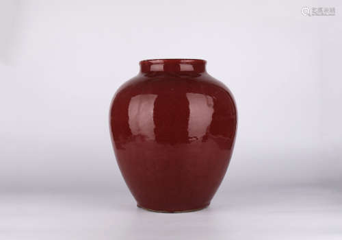 A red glazed jar