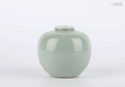 A celadon-glazed jar