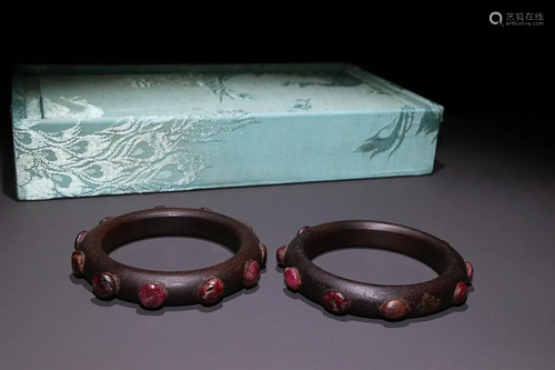 PAIR OF RUBY-INLAID AGARWOOD BANGLES