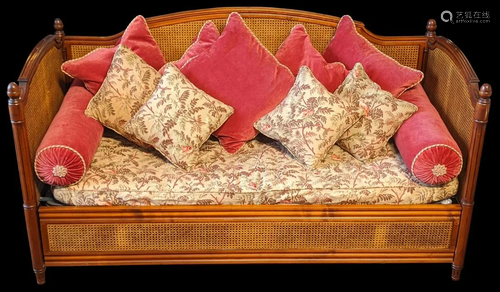 A bergere day bed settee, acorn finials and fluted