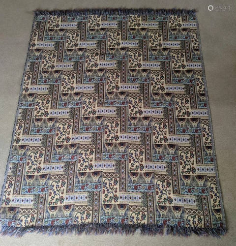 An embroidered tapestry textile rug, 70cm x 40cm