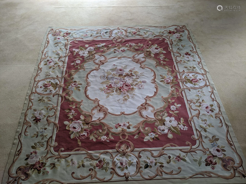 A Large Aubusson style embroidered carpet