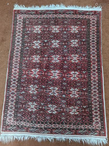 A red ground Afghan rug, 156cm x 112cm