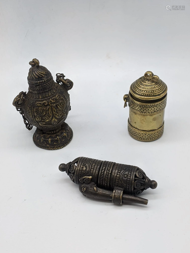 Three brass and bronze containers including a Nepalese