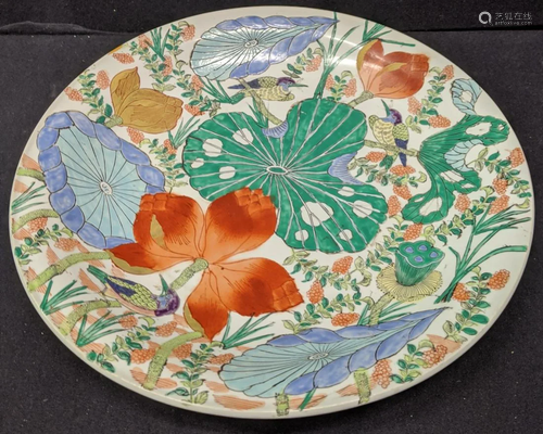 A Chinese 19th century bowl, decorated with flora and