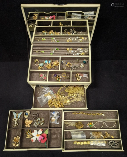 A set of drawers containing a collection of costume