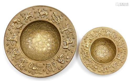 Two hammered brass bowls, each with zodiac borders, 21.5cm a...