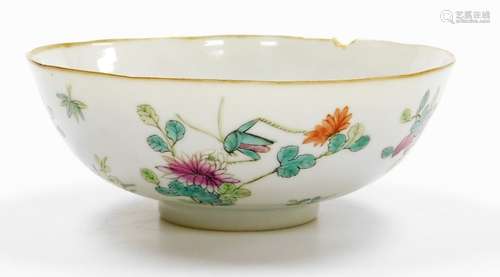 A Chinese porcelain bowl, enamelled with a grasshopper on fl...