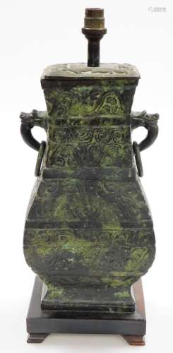 A Chinese bronze vase of square section, converted to a tabl...