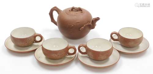 A Chinese Yixing tea set, comprising teapot with moulded vin...