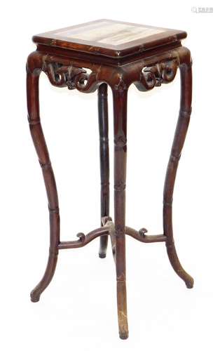 A late 19thC Chinese hardwood plant stand, the square top wi...