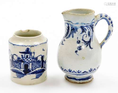 A Delft sparrow beak milk jug, and a pearl ware small tea ca...