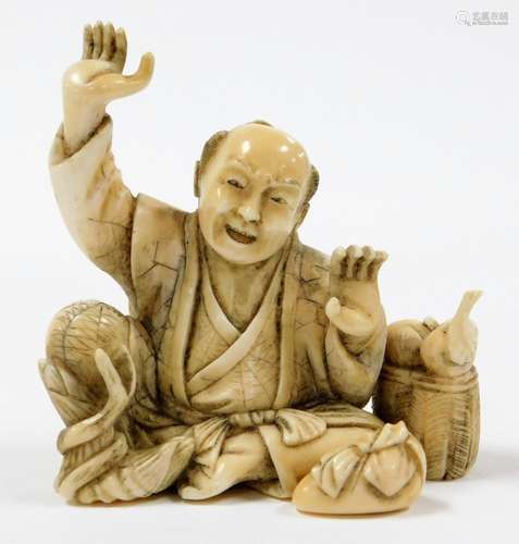 A Japanese ivory okimono of a seated man, with bamboo and ba...